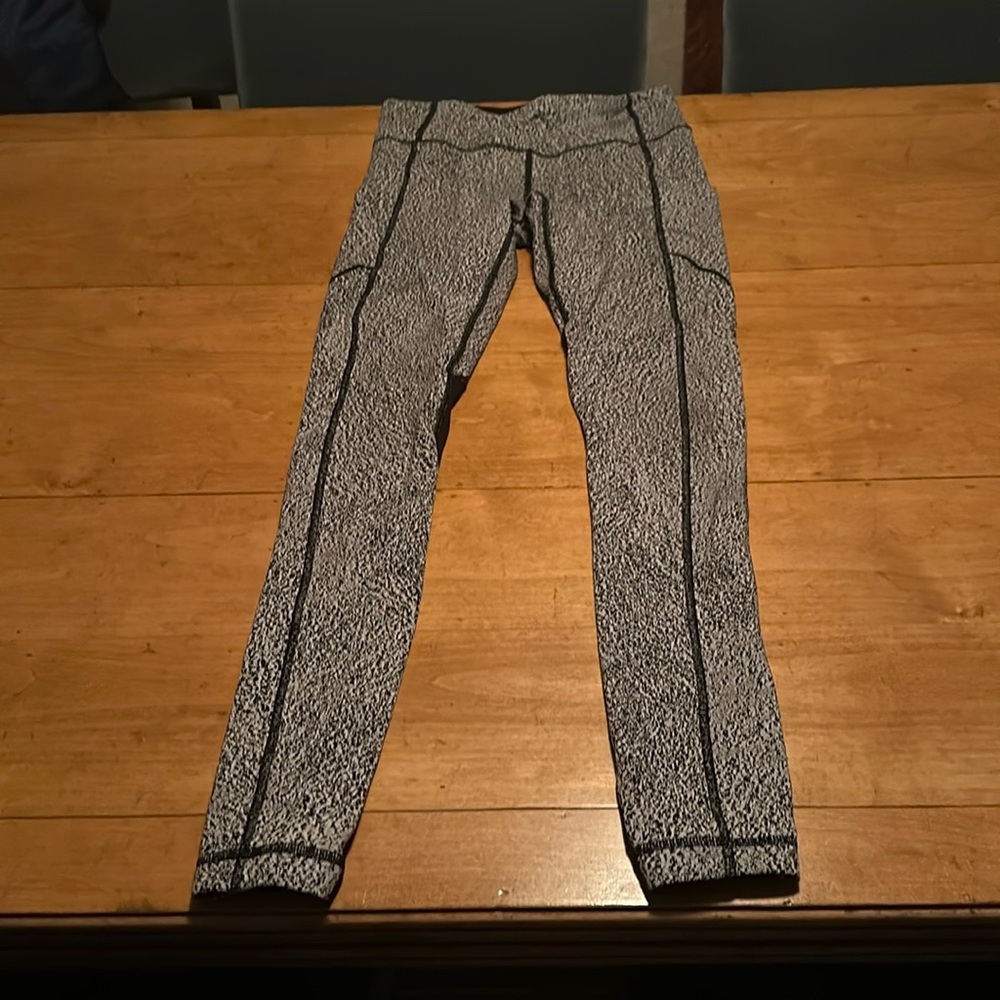 Great condition Lululemon black and gray leggings, side, pockets and back pocket